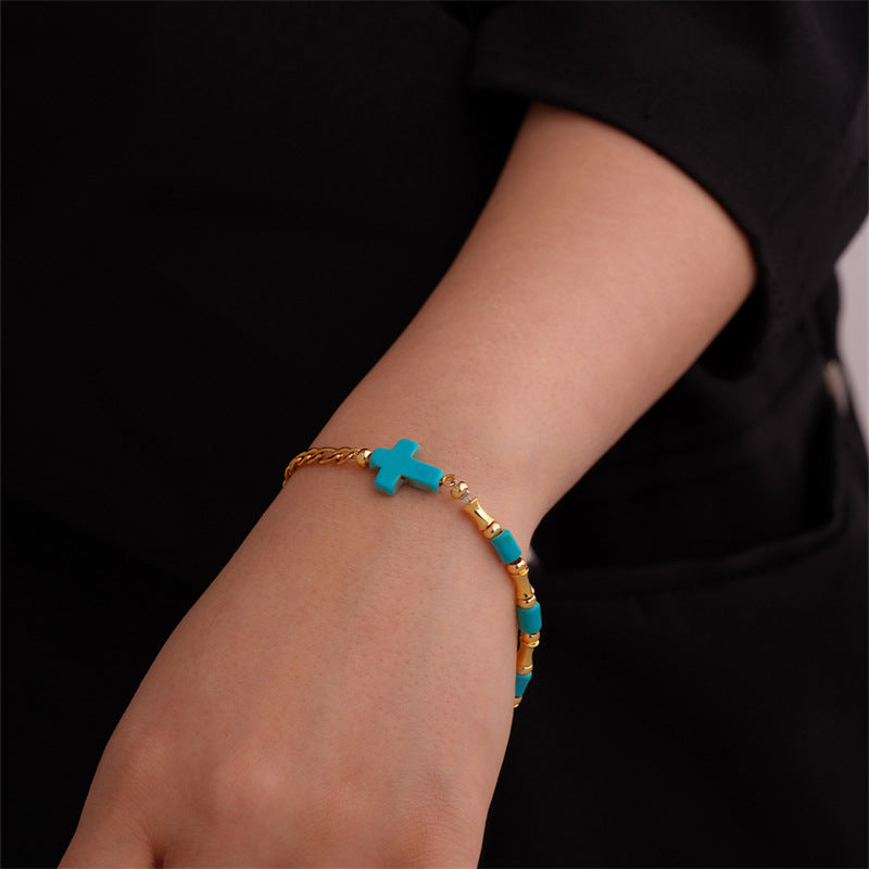 Christianartworkshop Nischen-Armband mit türkisfarbenem Kreuz und goldener Kette - image 2
