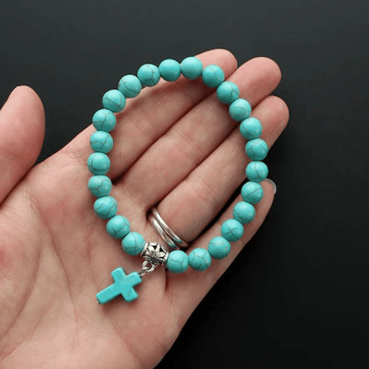 Christianartworkshop Armband mit matten, türkisfarbenen Perlen und Kreuzform - image 2