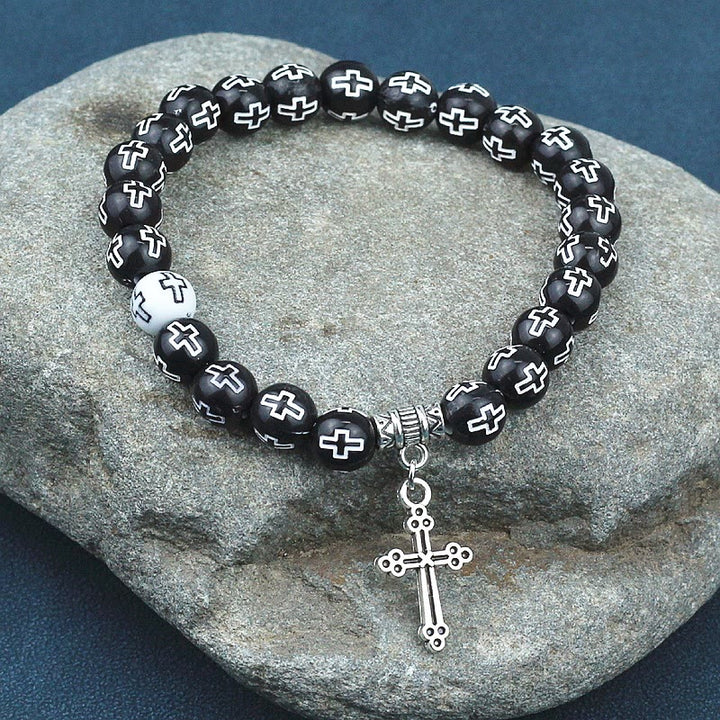 Christianartworkshop Armband mit schwarz-weiß bedruckten Perlen und Kreuz - image 1