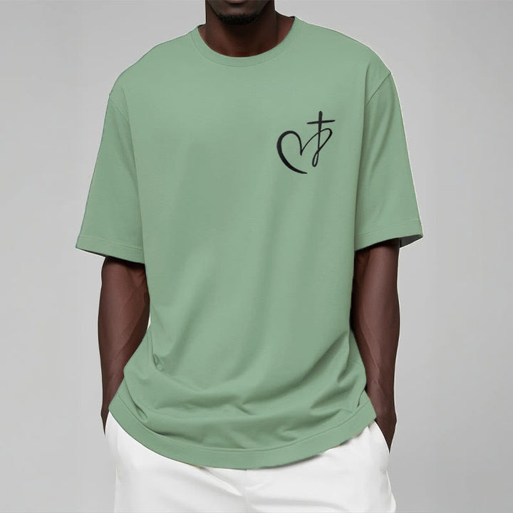 Christianartworkshop – Kurzärmliges, gewaschenes T-Shirt im minimalistischen Stil mit gesegnetem Herzen und Kreuz