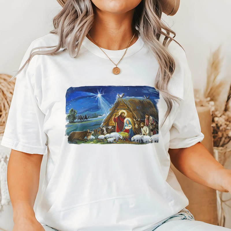 Christianartworkshop Farbiges Kurzarm-T-Shirt mit Motiv des Sterns von Bethlehem und Krippenszene - image 1
