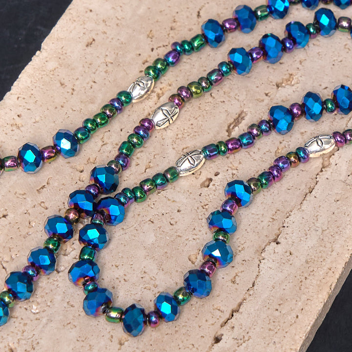 Christianartworkshop Rosenkranz „Unsere Liebe Frau von Guadalupe und Dreifaltigkeitskreuz“ aus 4 x 6 mm Polyeder, blauer Kristall, Nylonschnur