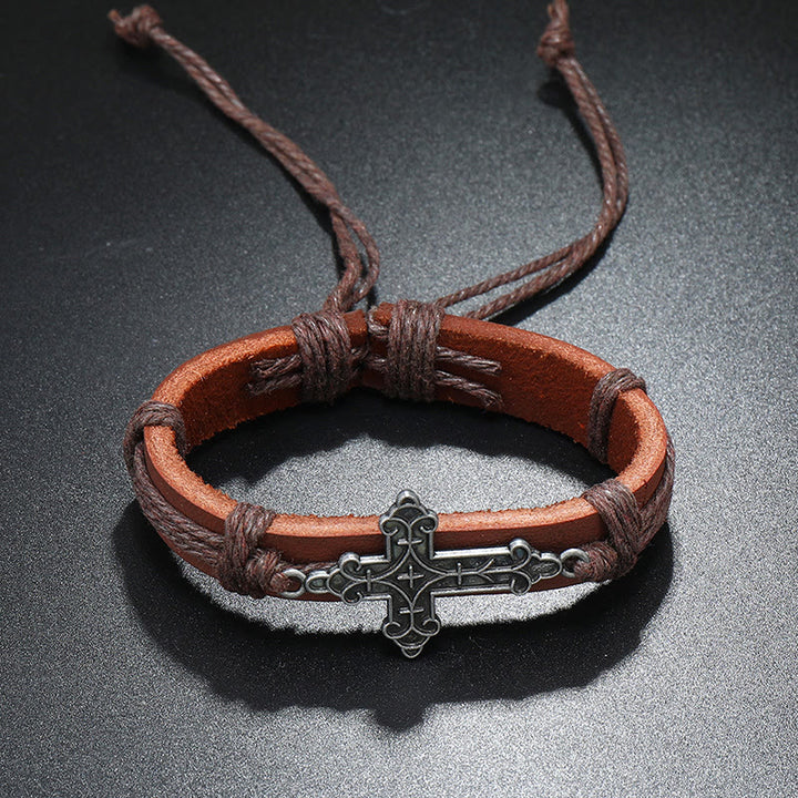 Christianartworkshop Armband mit Kreuzanhänger im alten Handwerksstil, Lederkordelzug, verstellbar, treu gebunden