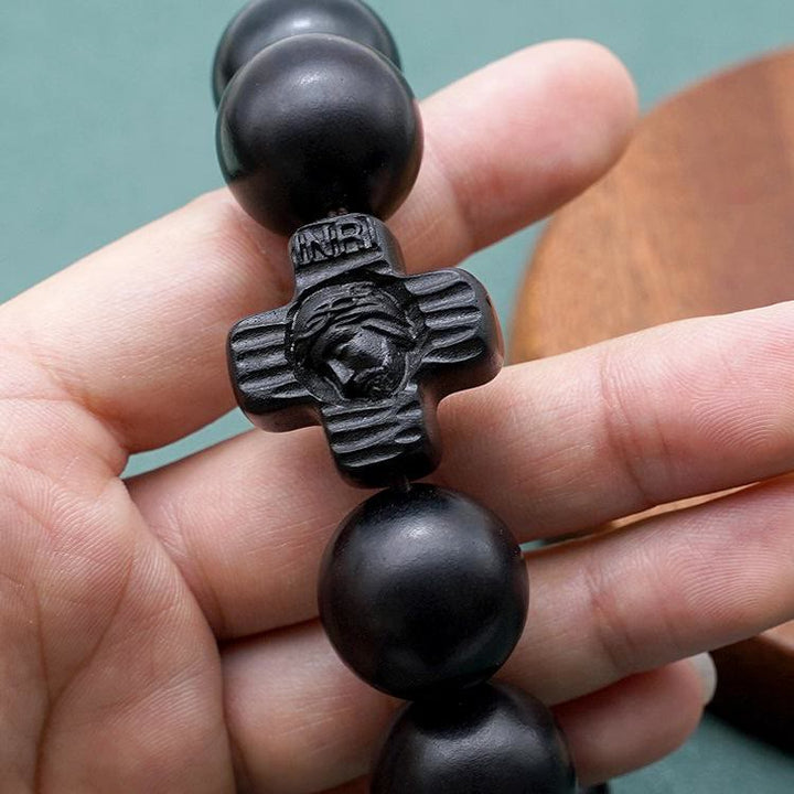 Christianartworkshop Klassisches Rosenkranz-Armband mit Jesus-Christus-Kreuz, schwarzes Sandelholz