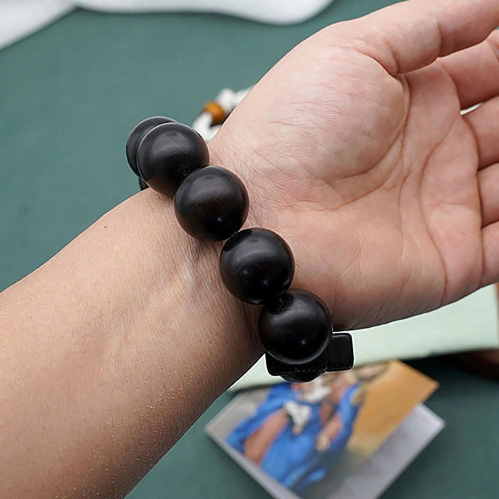 Christianartworkshop Klassisches Rosenkranz-Armband mit Jesus-Christus-Kreuz, schwarzes Sandelholz