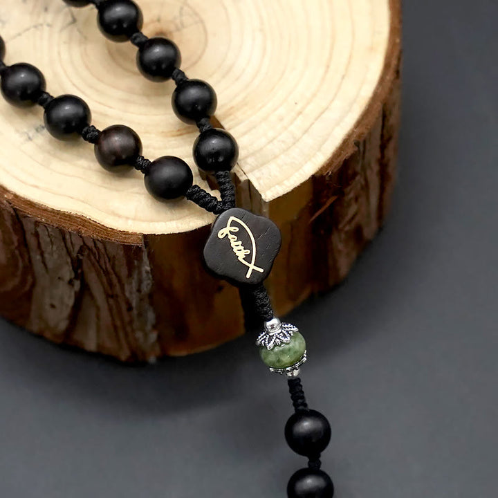 Christianartworkshop Jesuskreuz aus 8 mm rundem Rosenkranz aus braun/schwarzem Sandelholz und Nylonschnur