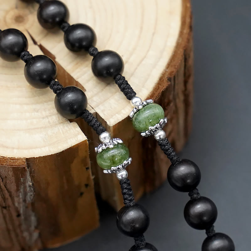Christianartworkshop Jesuskreuz aus 8 mm rundem Rosenkranz aus braun/schwarzem Sandelholz und Nylonschnur
