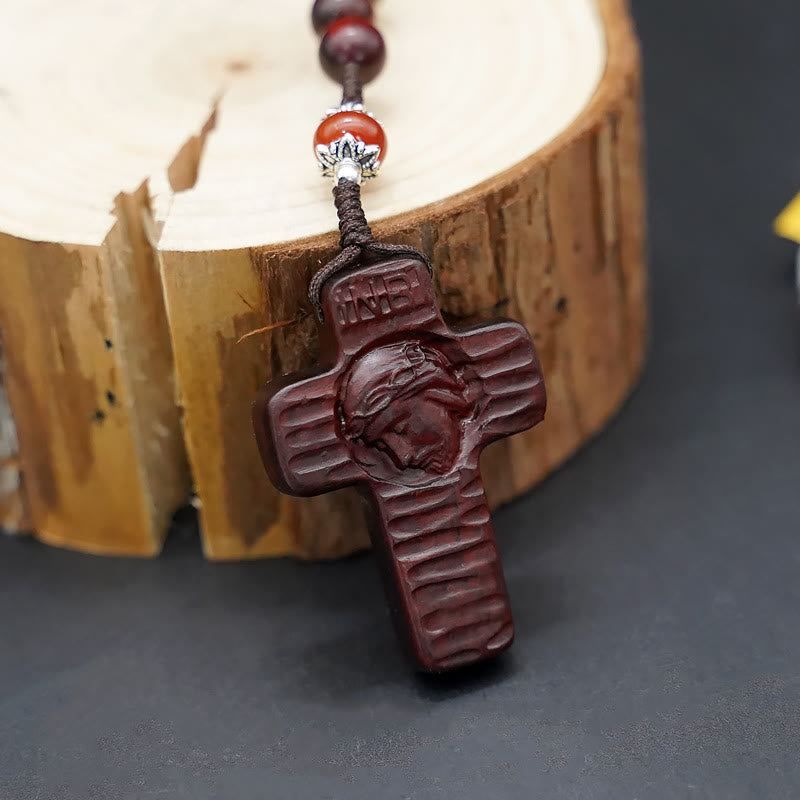 Christianartworkshop Jesuskreuz aus 8 mm rundem Rosenkranz aus braun/schwarzem Sandelholz und Nylonschnur