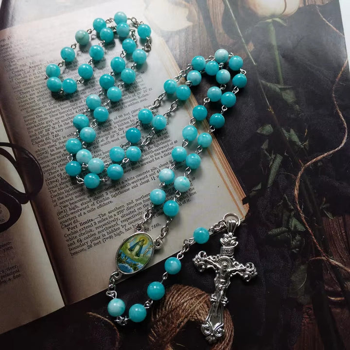 Christianartworkshop Rosenkranzkette mit Jungfrau Maria und Kruzifix, 8 mm rund, blauer Stein, Legierung