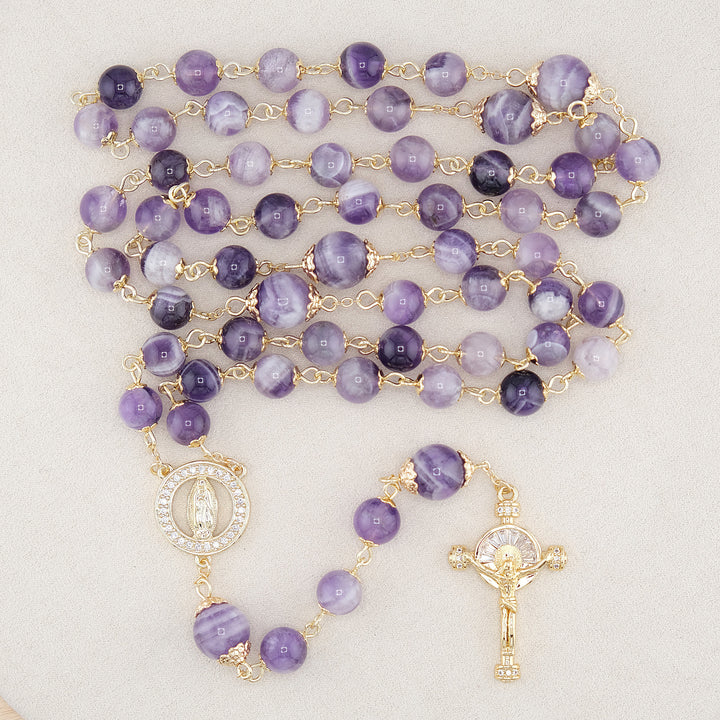 Christianartworkshop Rosenkranz „Unsere Liebe Frau von Guadalupe“ und Kruzifix aus 8 mm rundem violettem Kristall