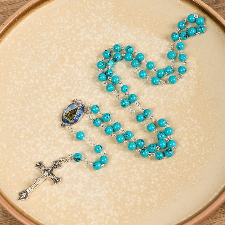 Christianartworkshop Rosenkranz „Unsere Liebe Frau von Aparecida“ und Kruzifix aus 8 mm runder grüner Glaslegierungskette
