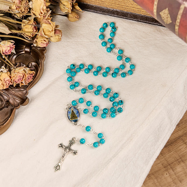 Christianartworkshop Rosenkranz „Unsere Liebe Frau von Aparecida“ und Kruzifix aus 8 mm runder grüner Glaslegierungskette