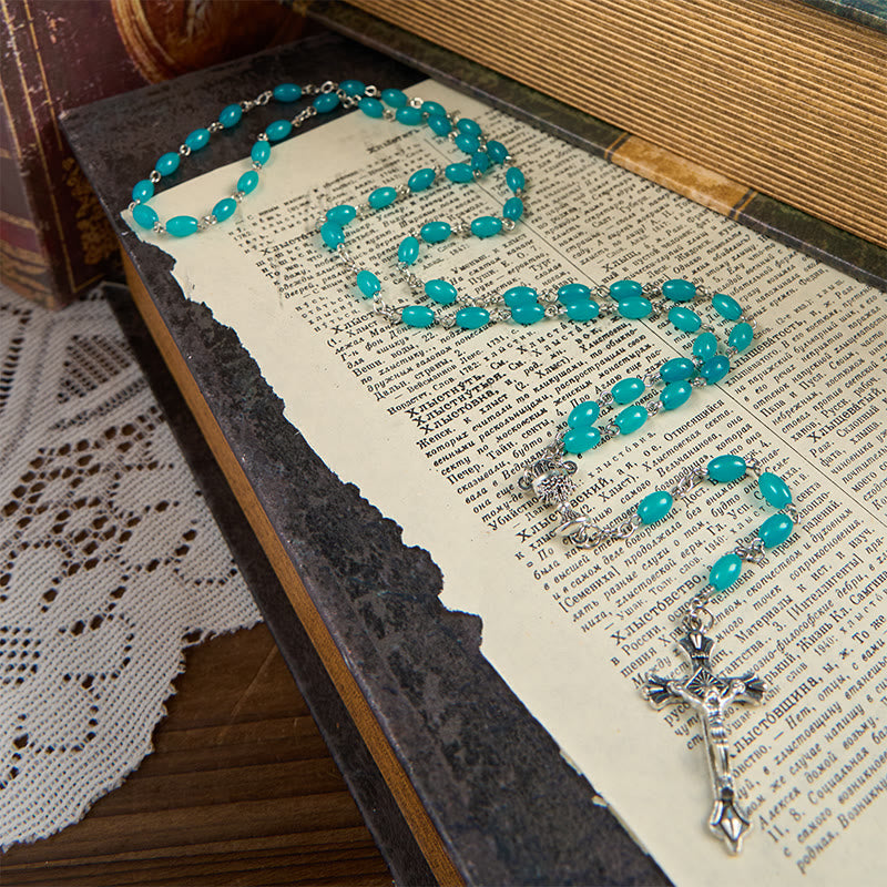 Christianartworkshop Rosenkranz mit Gebetsperlen aus aquablauem Kristall, Heilige Gail und Kruzifix, 6 mm