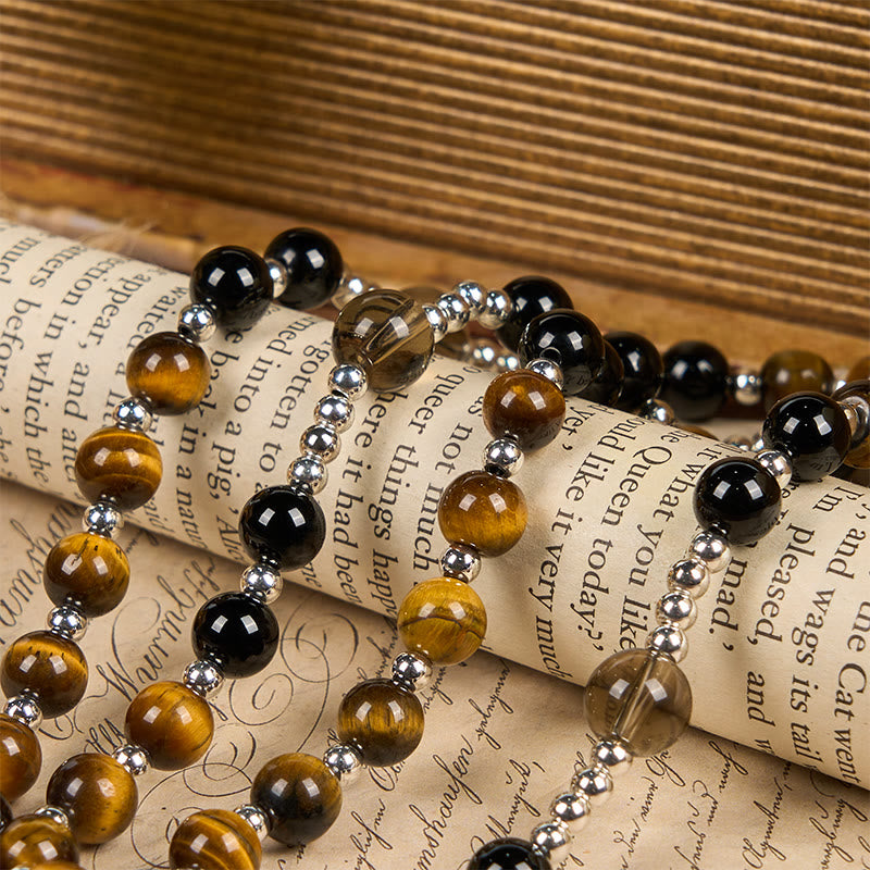 Christianartworkshop Rosenkranz-Halskette aus natürlichem Obsidian und Tigerauge – Rosenkranz mit Kreuz aus Hämatitstein