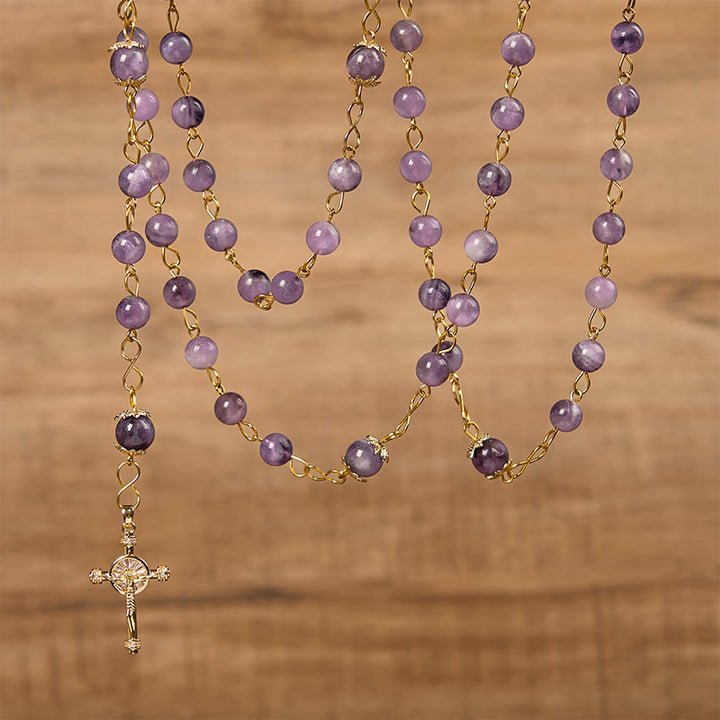 Christianartworkshop Rosenkranz „Unsere Liebe Frau von Guadalupe“ und Kruzifix aus 8 mm rundem violettem Kristall