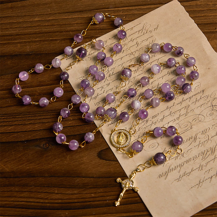 Christianartworkshop Rosenkranz „Unsere Liebe Frau von Guadalupe“ und Kruzifix aus 8 mm rundem violettem Kristall