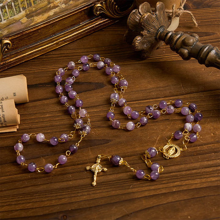 Christianartworkshop Rosenkranz „Unsere Liebe Frau von Guadalupe“ und Kruzifix aus 8 mm rundem violettem Kristall