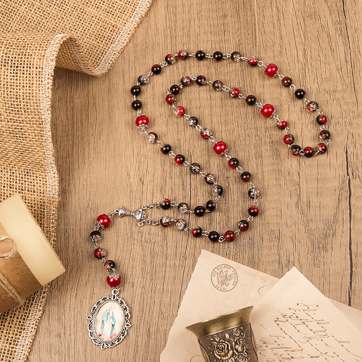 Christianartworkshop Rosenkranz mit Heiliger Gail und Wundertätiger Medaille aus 8 mm runden schwarz-roten Glasperlen