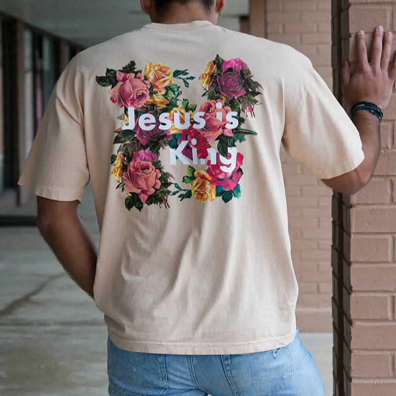 Christianartworkshop Christliches T-Shirt mit Blumenverzierung „Jesus ist König“