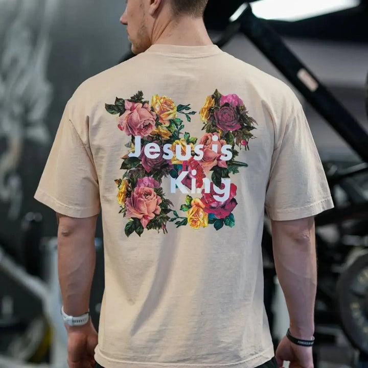 Christianartworkshop Christliches T-Shirt mit Blumenverzierung „Jesus ist König“