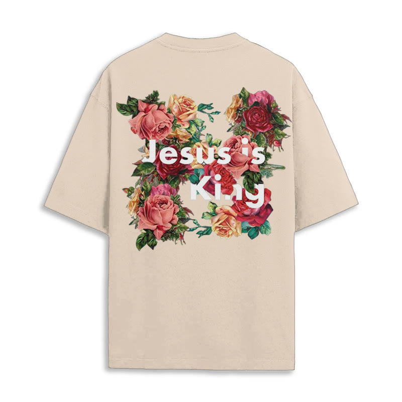Christianartworkshop Christliches T-Shirt mit Blumenverzierung „Jesus ist König“