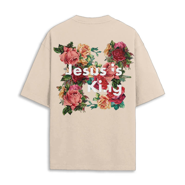 Christianartworkshop Christliches T-Shirt mit Blumenverzierung „Jesus ist König“