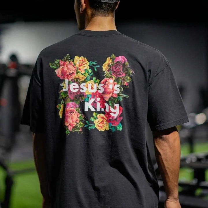 Christianartworkshop Christliches T-Shirt mit Blumenverzierung „Jesus ist König“
