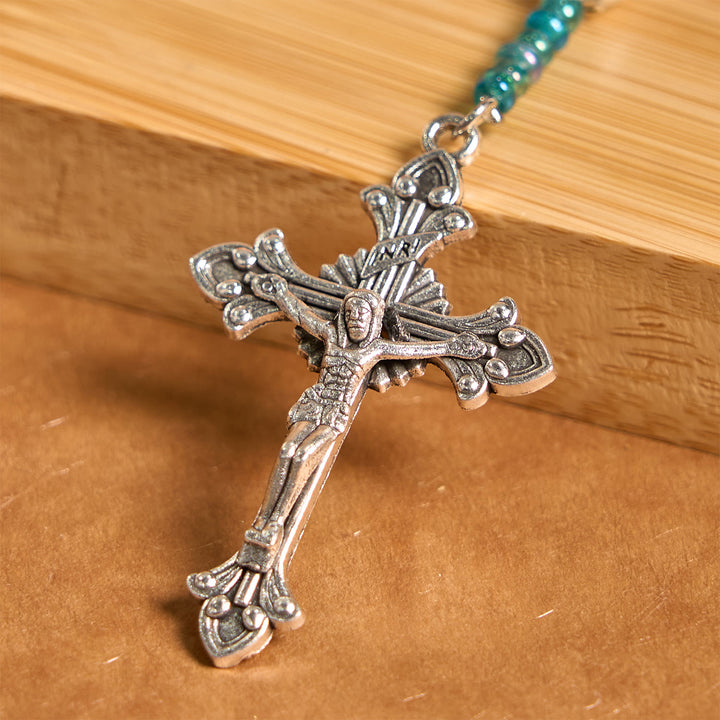 Christianartworkshop Rosenkranz mit Medaille und Kruzifix Unserer Lieben Frau aus 8 mm runden blau-türkisfarbenen Perlen