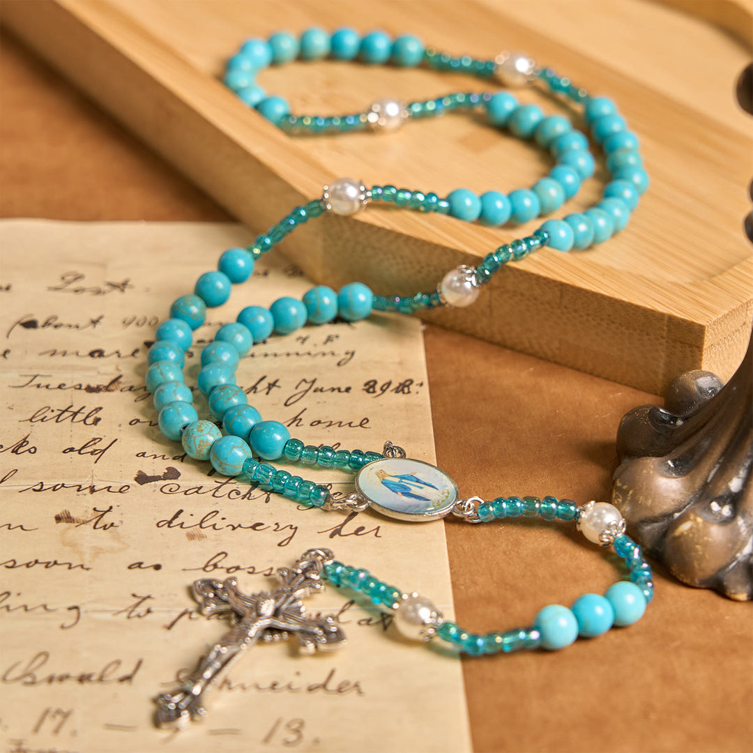 Christianartworkshop Rosenkranz mit Medaille und Kruzifix Unserer Lieben Frau aus 8 mm runden blau-türkisfarbenen Perlen