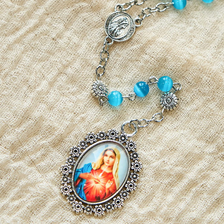 Christianartworkshop Rosenkranz „Unbeflecktes Herz Mariens“, 6 mm, glänzende Glasperlen, seeblau, 7 Leiden