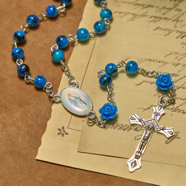 Christianartworkshop Rosenkranz mit königsblauen Steinperlen und der wundertätigen Medaille und Kruzifix