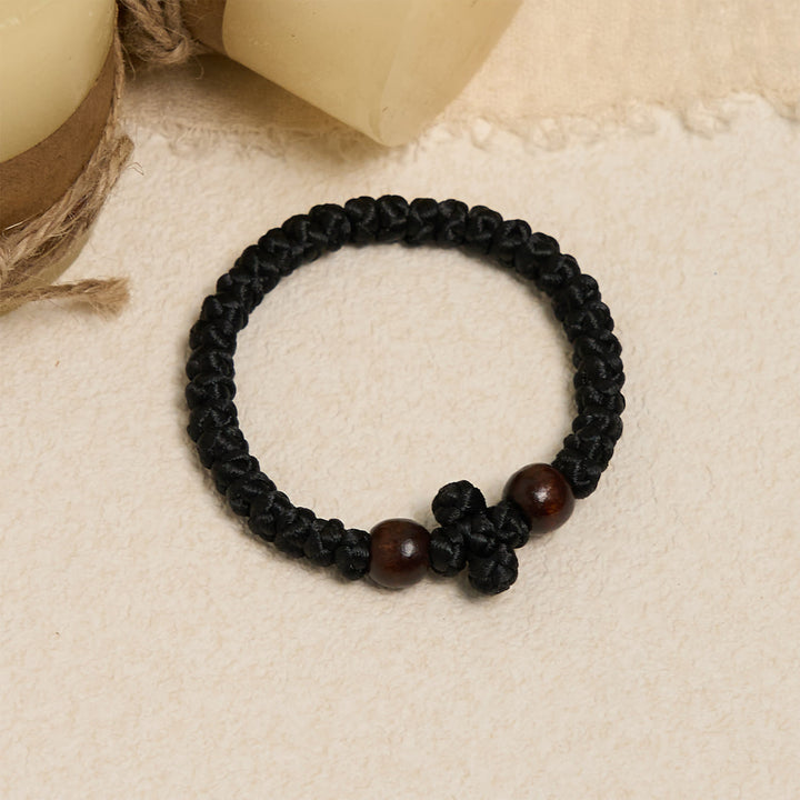 Christianartworkshop Blaues und schwarzes Kreuz – Knotenarmband: Ein Zeichen des Glaubens