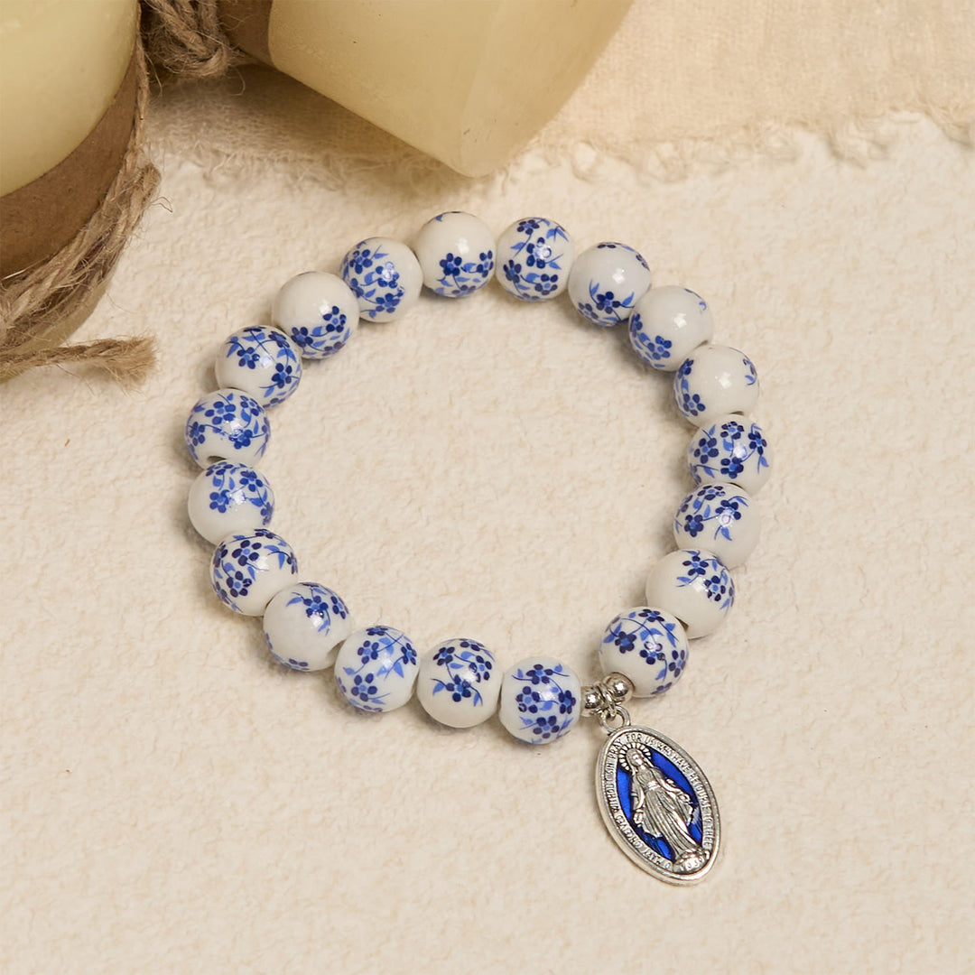Christianartworkshop Armband mit Blumenmuster und Perlen in Blau und Weiß mit Wundertätiger Medaille