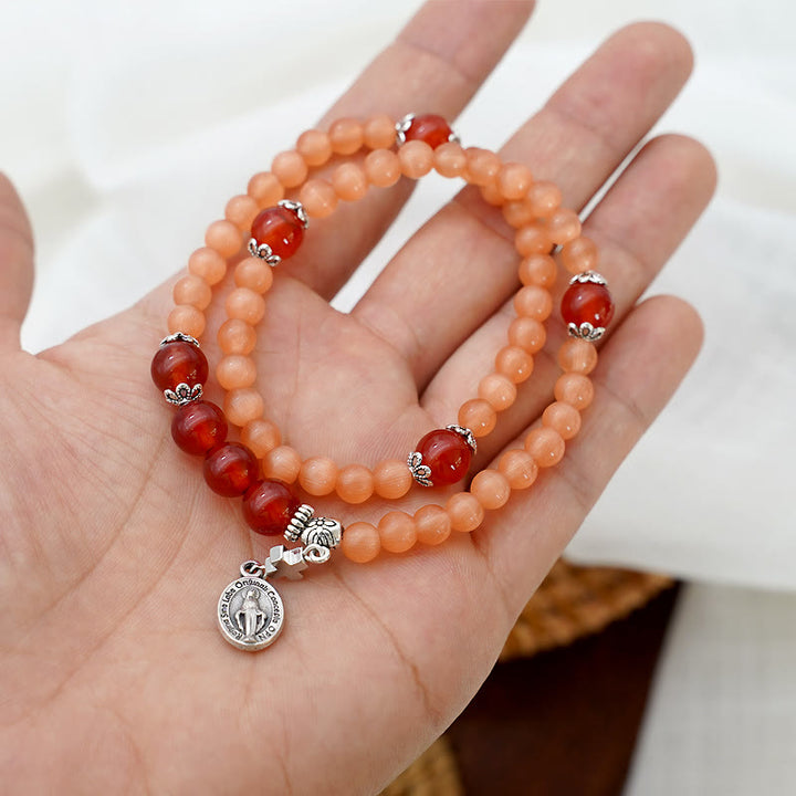 Minimalistisches, verstellbares Armband von Christianartworkshop mit mehrfarbigen Katzenaugensteinen und Wundermedaille - image 13