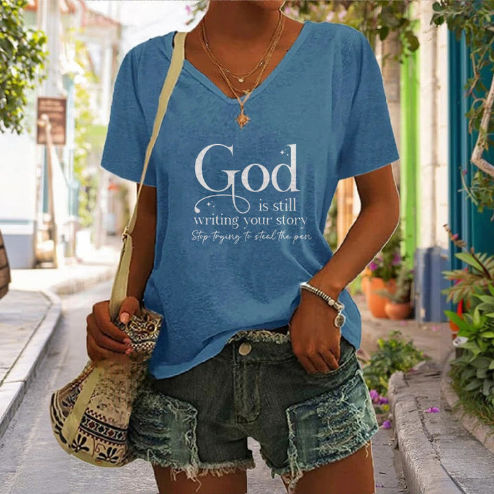 Christianartworkshop Damen T-Shirt mit V-Ausschnitt und Aufdruck „God Is Still Writing Your Story“