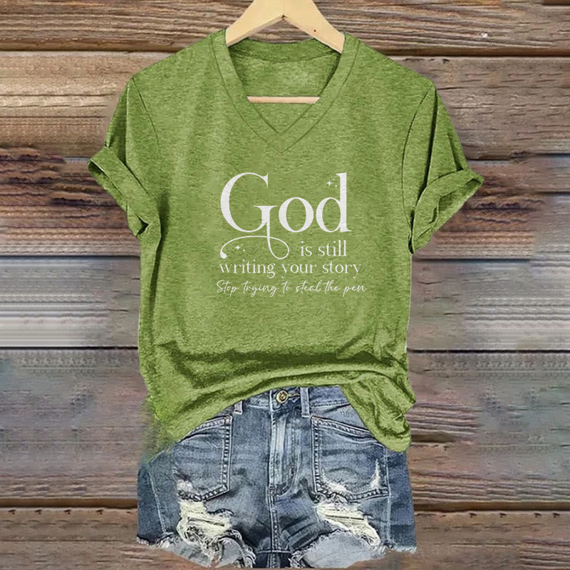 Christianartworkshop Damen T-Shirt mit V-Ausschnitt und Aufdruck „God Is Still Writing Your Story“