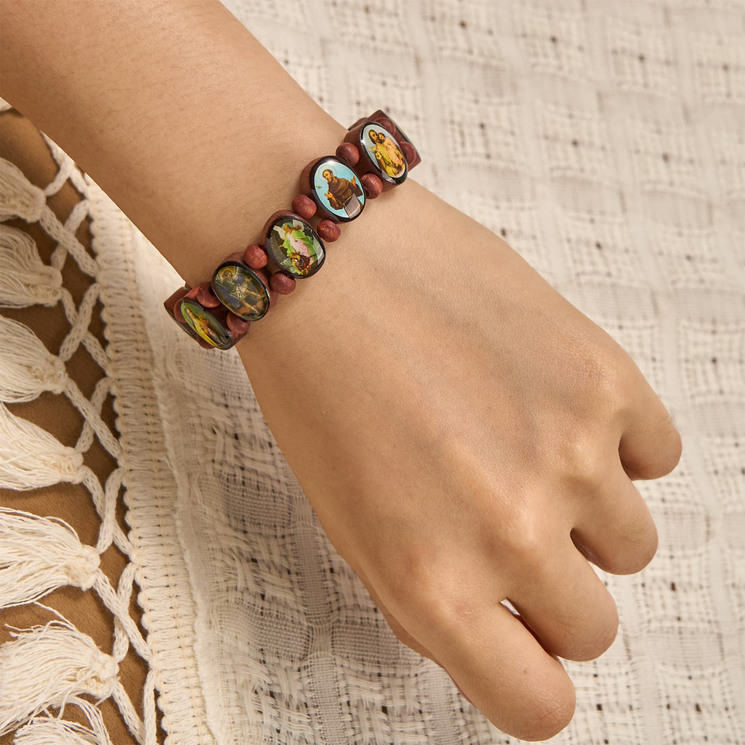 Klassisches Stretch-Armband aus Holzperlen von Christianartworkshop mit Ikonen von Maria, Jesus und Heiligen - image 3