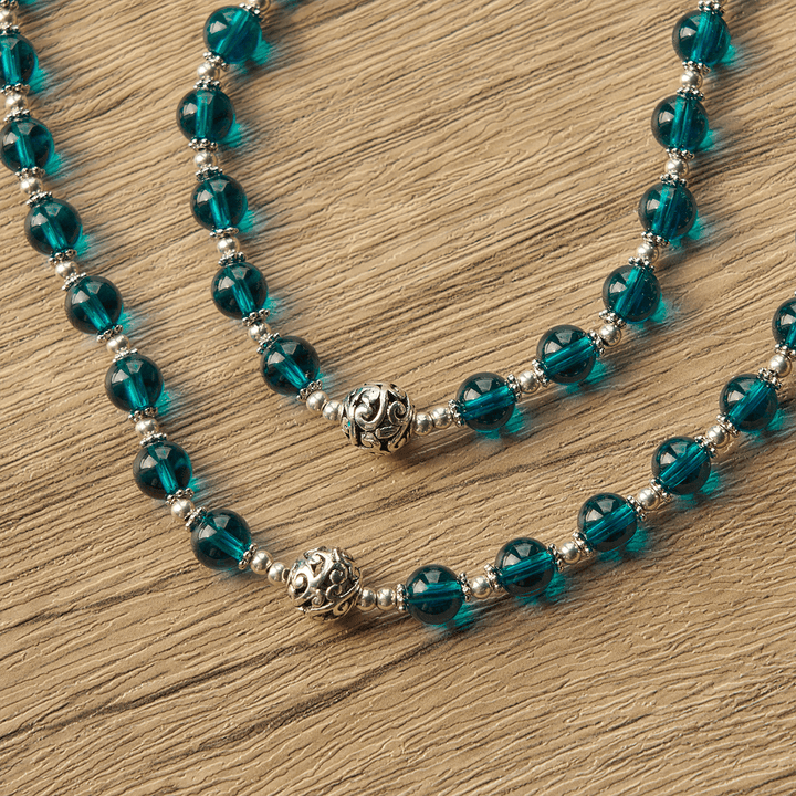 Christianartworkshop Handgefertigter Rosenkranz aus klarem, blauem Glas mit Kruzifix, emaillierter St.-Benedikt-Figur und Wundermedaille - image 9