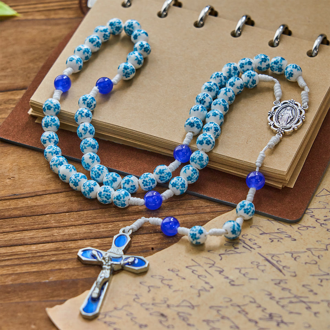 Christianartworkshop Rosenkranz mit Perlen und blauem Blütenmuster, mit Wundertätiger Medaille und Kruzifix