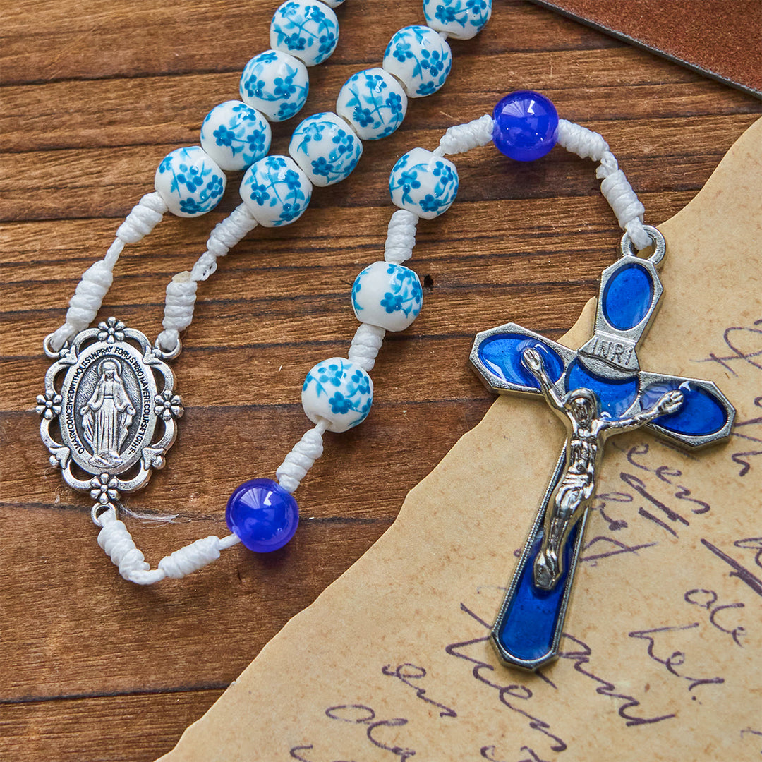 Christianartworkshop Rosenkranz mit Perlen und blauem Blütenmuster, mit Wundertätiger Medaille und Kruzifix