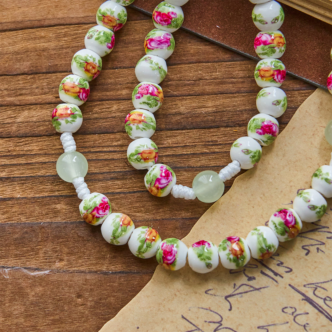 Christianartworkshop Handgefertigter Rosenkranz mit Blumenmuster und wundertätiger Medaille und grünem Emaille-Kruzifix