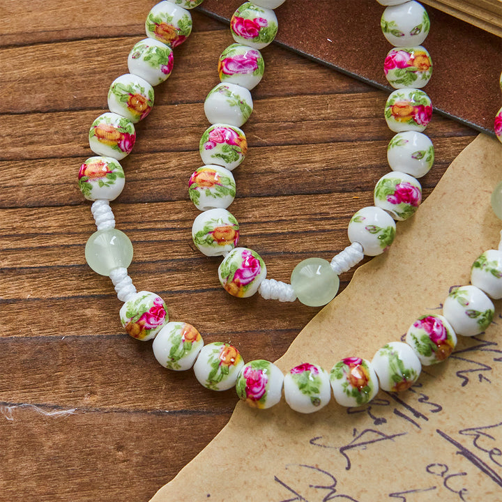 Christianartworkshop Handgefertigter Rosenkranz mit Blumenmuster und wundertätiger Medaille und grünem Emaille-Kruzifix