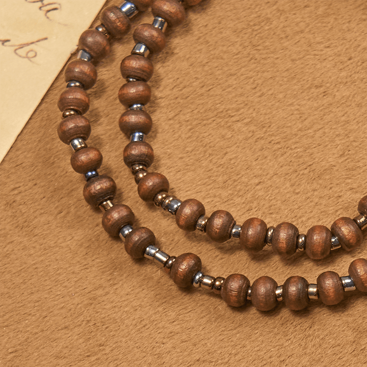Christianartworkshop Klassisches Holzperlenarmband mit Kreuz: Zeitloses Symbol des dezenten Glaubens