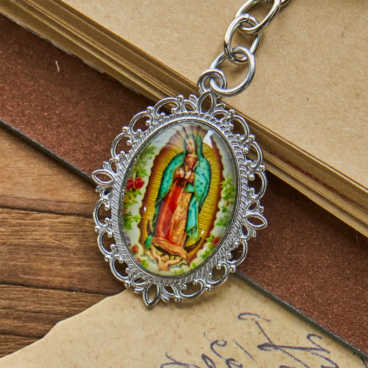 Christianartworkshop Schlüsselanhänger mit Medaille Unserer Lieben Frau mit Tauben- und Blütenmuster: Ideal als Geschenk zur Taufe - image 6