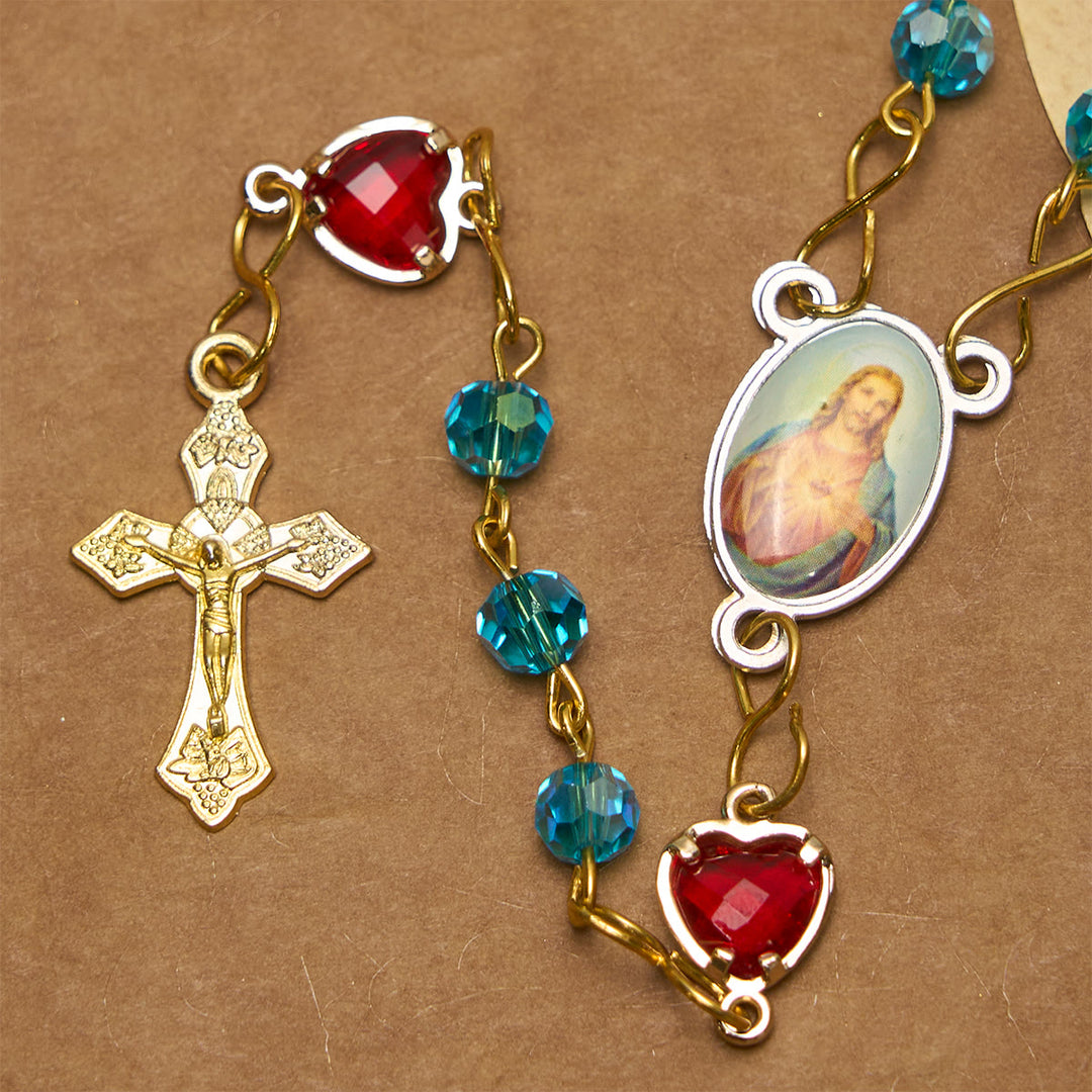 Christianartworkshop Rosenkranz mit Herz-Jesu-Anhänger und Kruzifix aus 6 mm Polyeder, blaue Glaslegierung