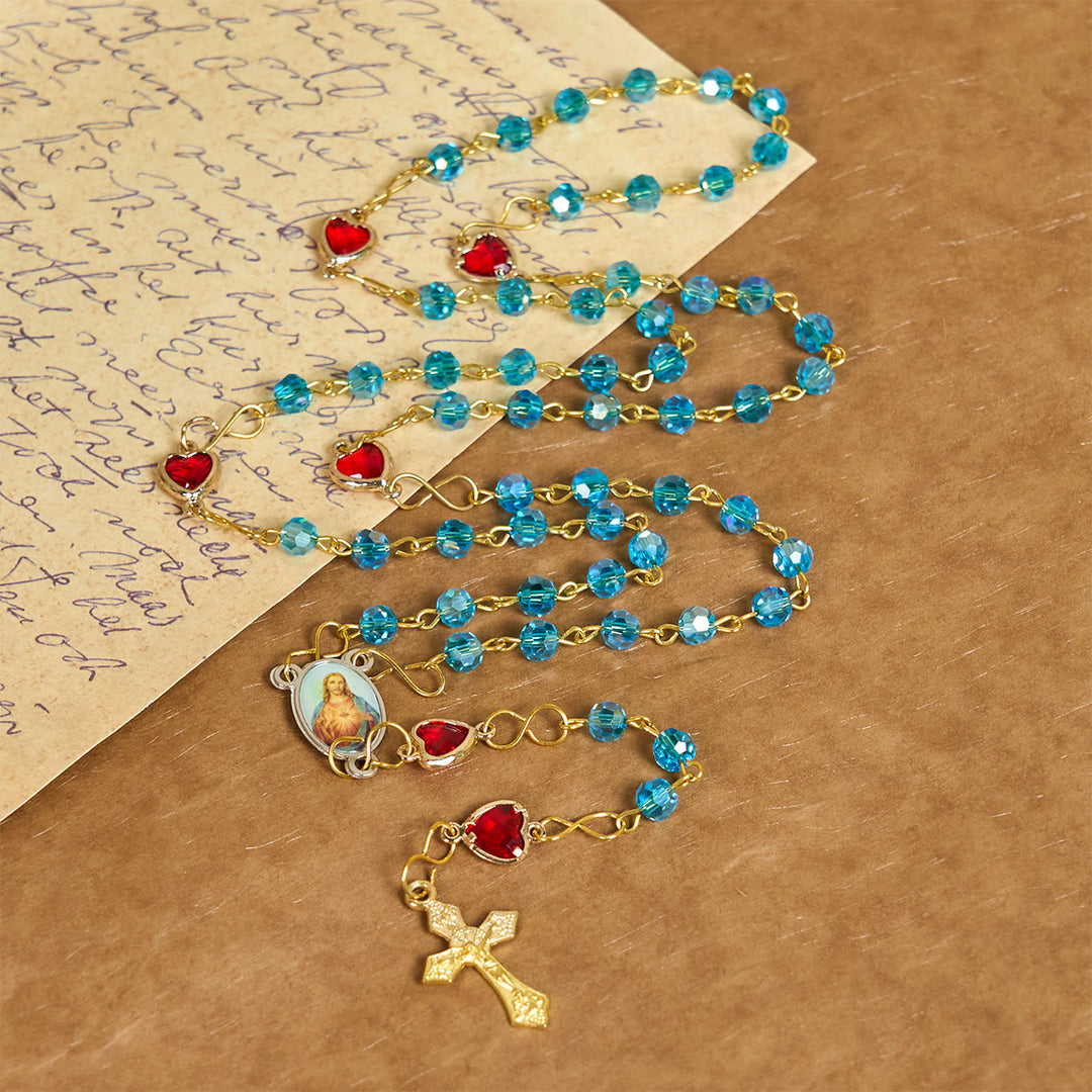 Christianartworkshop Rosenkranz mit Herz-Jesu-Anhänger und Kruzifix aus 6 mm Polyeder, blaue Glaslegierung