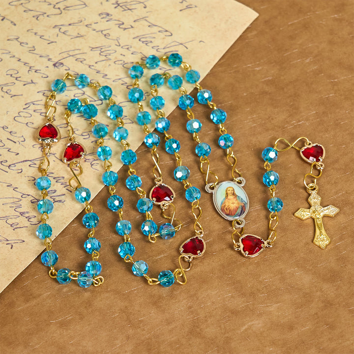 Christianartworkshop Rosenkranz mit Herz-Jesu-Anhänger und Kruzifix aus 6 mm Polyeder, blaue Glaslegierung