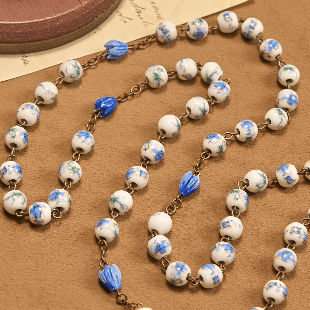 Christianartworkshop Rosenkranz mit unbeflecktem Herzen Mariens und Kruzifix, rund, 8 mm, blaue Kette aus Acryllegierung mit Blumenmuster - image 8