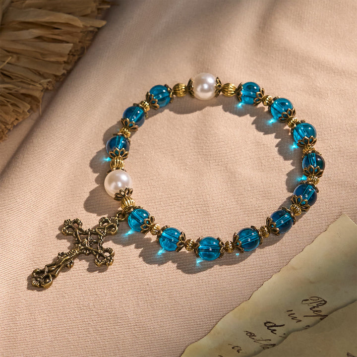 Christianartworkshop Spirituelle Armbänder mit blauen Glanzperlen und heiligem Messingkruzifix - Blau - image 1