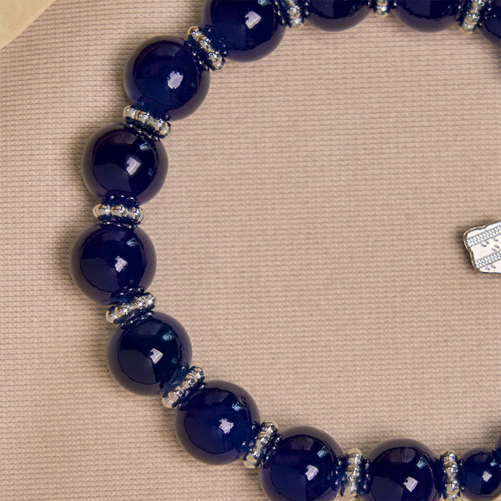 Christianartworkshop Elegante tiefblaue Perlenarmbänder mit Kruzifix und Wundertätiger Medaille - image 6